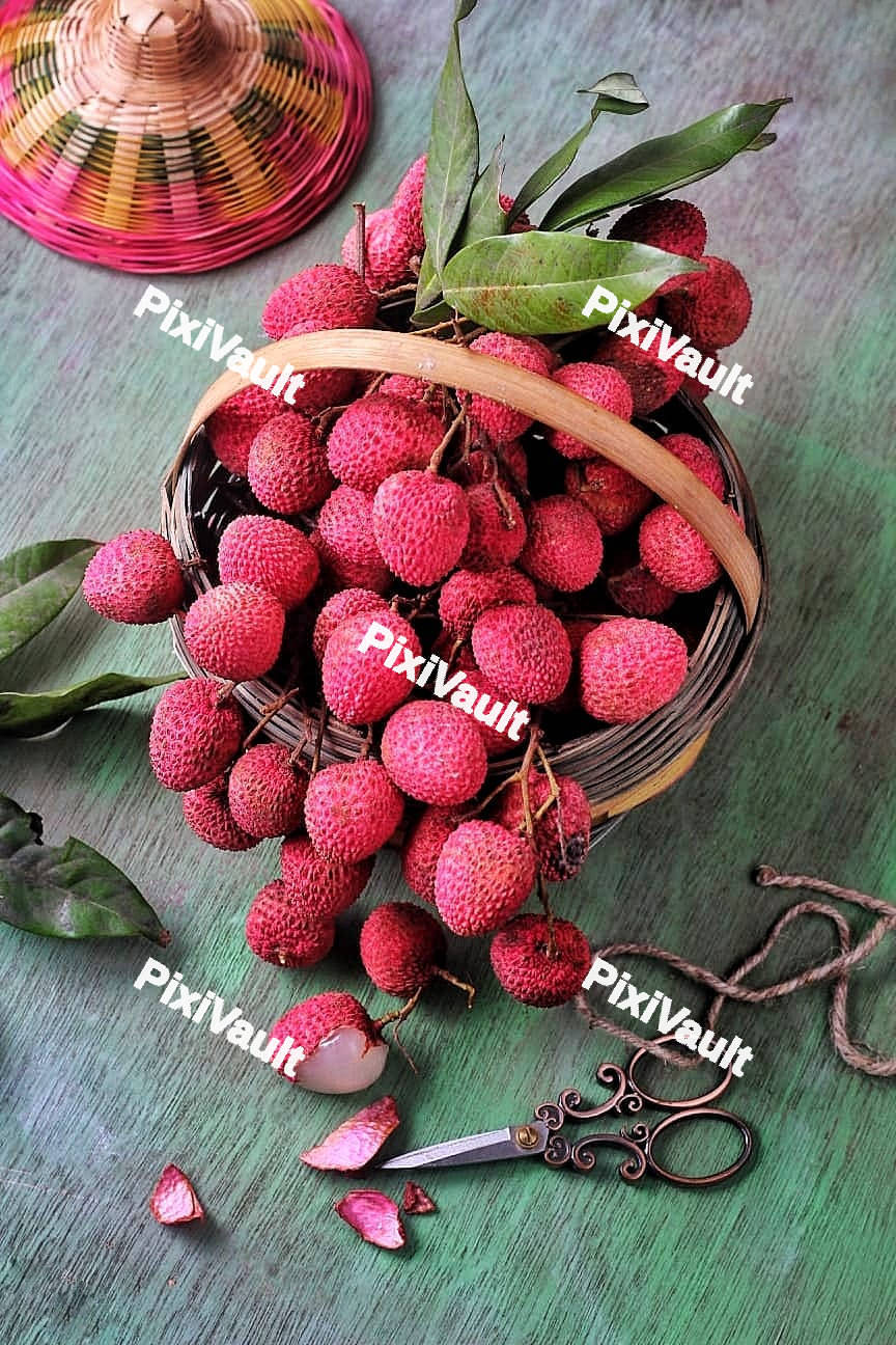 Lychee fruit placed in a basket